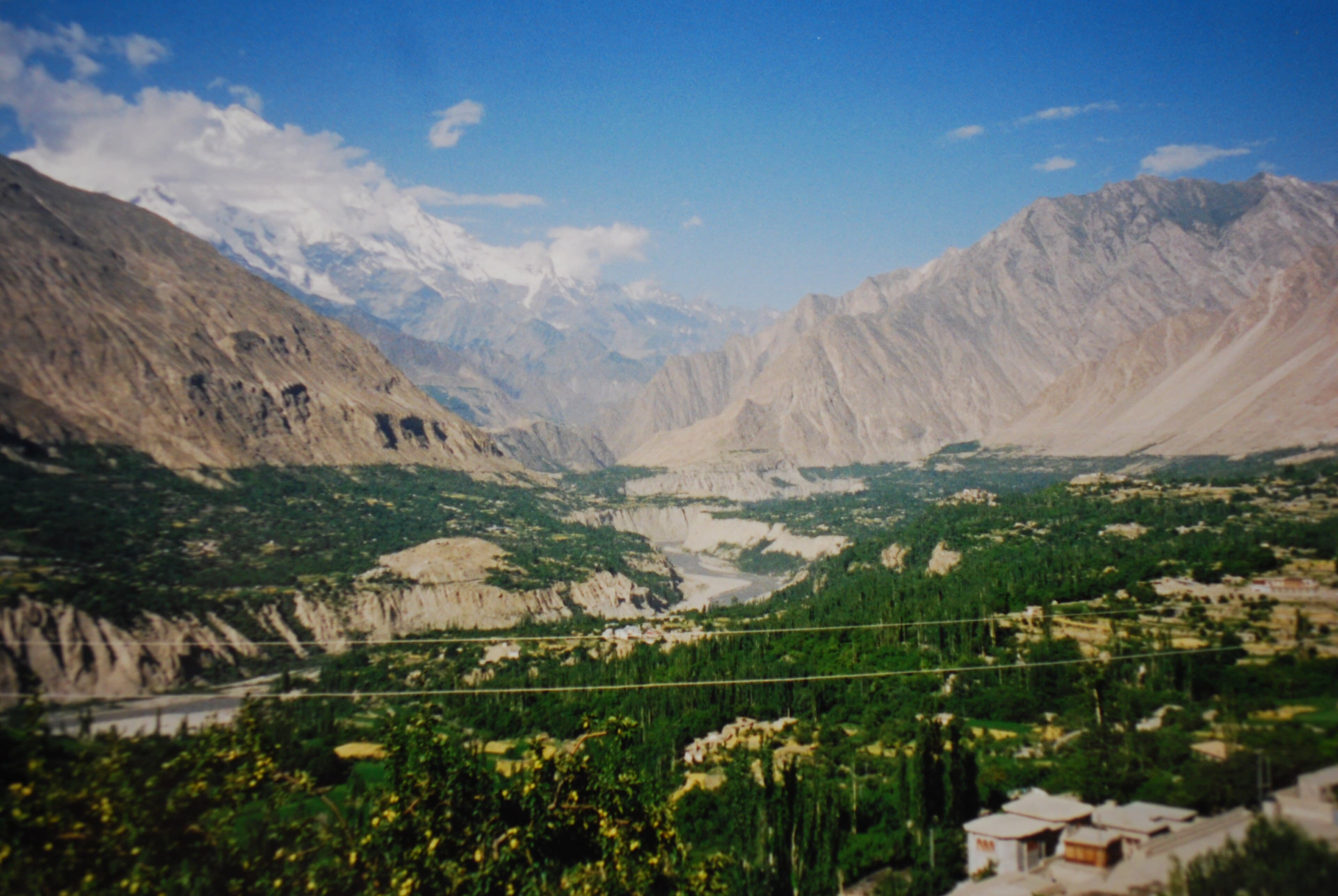 Traveler at a scenic Karakoram Highway viewpoint in safe Gilgit-Baltistan